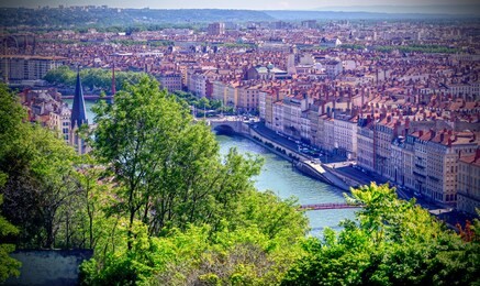 an aerial view of lyon, france and the saone river during morning hours.
