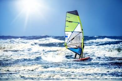 windsurfing, fun and action in the ocean water. extreme sunny sport .
