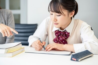 education concept of an asian high school girl. cram school. private teacher.