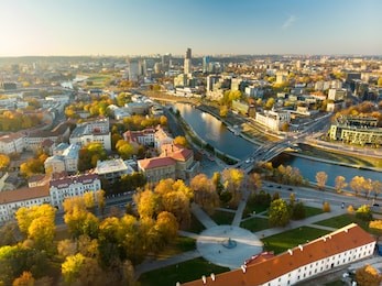 beautiful autumn panorama of vilnius old town taken from the gediminas hill. nice sunny october day in lithuania's capital.