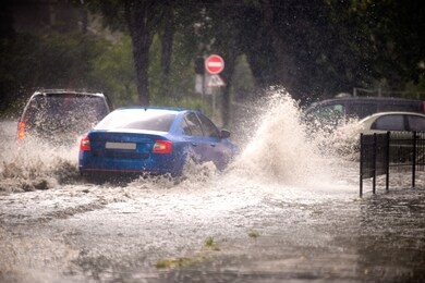 strong rain in the city. street of the city flooded after heavy rains