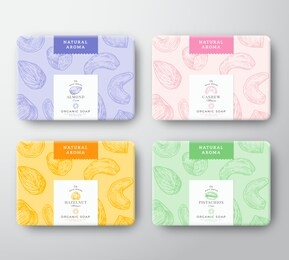 almond, cashew, hazelnut and pistachio soap cardboard boxes set. abstract vector wrapped paper container with label cover. packaging design. hand drawn nuts background pattern layout. isolated.
