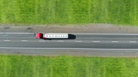 fuel truck driving. aerial view from drone.