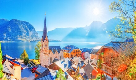 austria, hallstatt historical village. unesco world heritage site, old european architecture in sunlight. hallstatter see in background. hallstatt is iconic world landmark. autumn seasonal landscape.