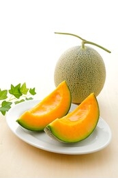 cantaloupe melon on wooden background