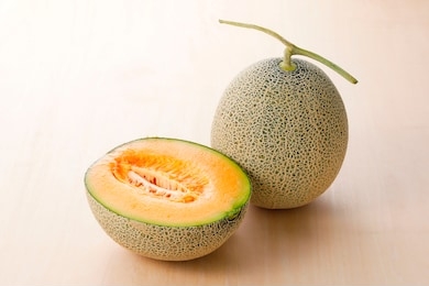 cantaloupe melon on wooden background