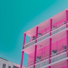 beach hotel in infrared style. tropical travel concept. minimalism and surreal. soft light pink colors