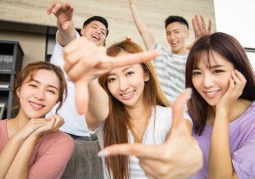 happy young people with looking and style gesture