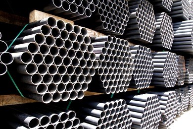 steel pipes bunch on the rack in warehouse