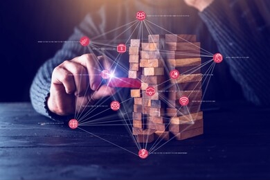 business man try to choose wood block from others on wooden table and black background business organization startup concept