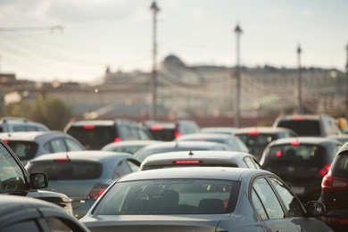cars in traffic jam in a city during rush hour
