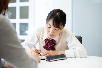 education concept of an asian high school girl. cram school. private teacher.