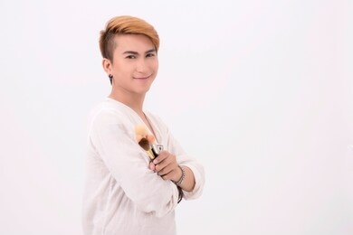 makeup artist fashion portrait asian male on white background
