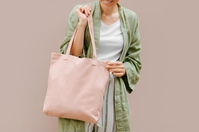 woman holding canvas tote bag. reusable eco bag. eco friendly concept.