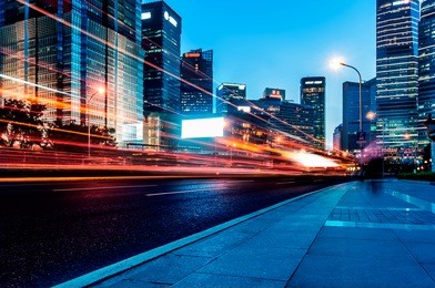 the light trails on the modern building background in shanghai china.