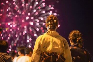 japanese girls wearing kimono are seen viewing fireworks in karatsu, saga prefecture. (image is slightly soft)
