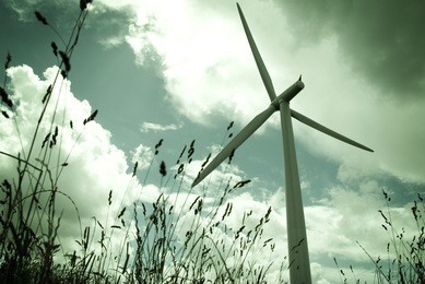 a wind turbine shot from a low angle.