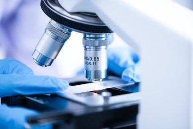 close-up of microscope lens, science tools microscope in laboratory