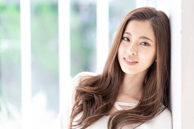 portrait of attractive asian woman hair care image