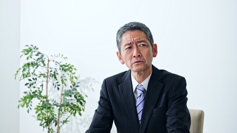 frustrated middle aged asian businessman. 