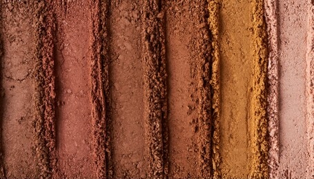 broken eyeshadows in trendy shades isolated on white background