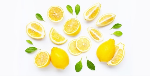 fresh lemon and  slices  with leaves isolated on white background.
