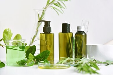 natural skin care beauty products, natural organic botany extraction and scientific glassware, blank label cosmetic container for branding mock-up. 
