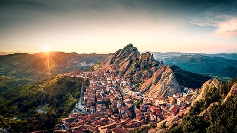 aerial view of pietrapertosa rural village in apennines dolomiti lucane. basilicata, italy, at sunset