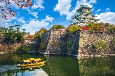 osaka castle, a tourist boat in the moat, japan