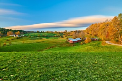 jenne farm with barn at sunny autumn morning in vermont, usa