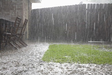 view of heavy rains in backyard