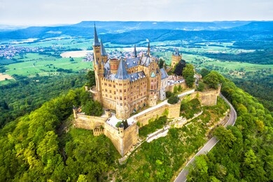 hohenzollern castle on mountain, germany. this castle is a famous landmark in stuttgart vicinity. aerial panoramic view of burg hohenzollern in summer. landscape of swabian alps with gothic castle.
