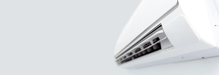 air conditioner split hanging on the wall. cooling device in room.