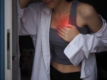 young teenager asia female feel heart pain.