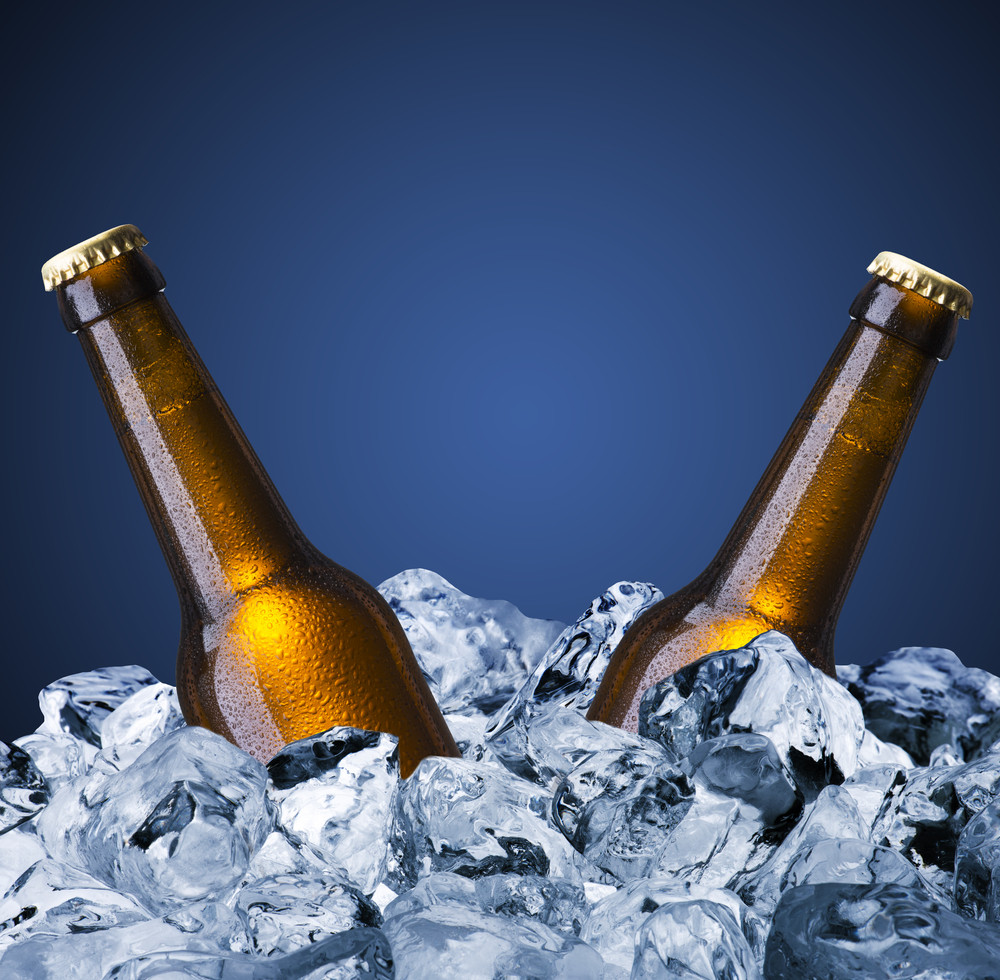 beer bottles with ice cube