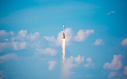 a real soyuz in flight, a launch vehicle from the baikonur cosmodrome. rocket take off in the sky against the background of clouds. startup concept, power of science and technology. 