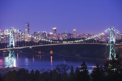 city skyline and lions gate bridge spanning burrard inlet vancouver british columbia canada