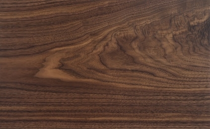 texture of black walnut board with oil finish