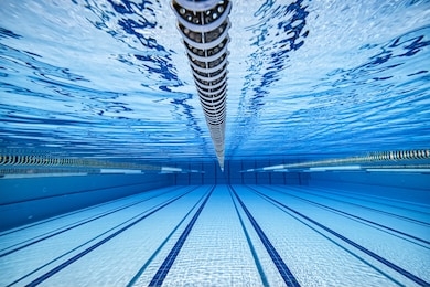 olympic swimming pool underwater background.