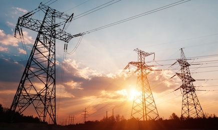 high-voltage power lines. electricity distribution station. high voltage electric transmission tower. distribution electric substation with power lines and transformers.