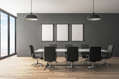 contemporary meeting room interior with empty poster, city view, furniture and daylight. presentation concept. mock up, 3d rendering 