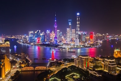 aerial view of shanghai cityscape beautiful  lighting night from the bund across river to pudong it is a famous landmark