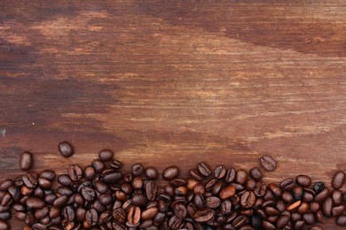 coffee beans on wood background