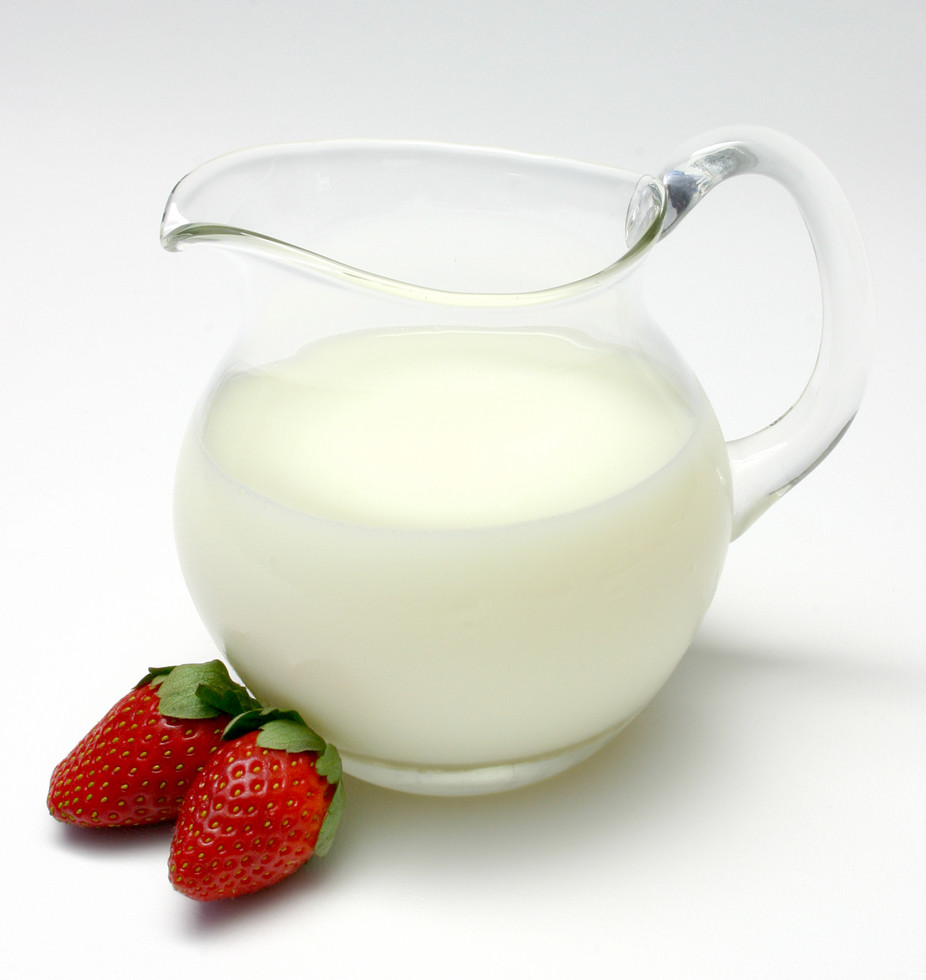 jug of skim milk photographed on white