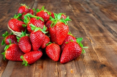 fresh strawberries on wooden table
