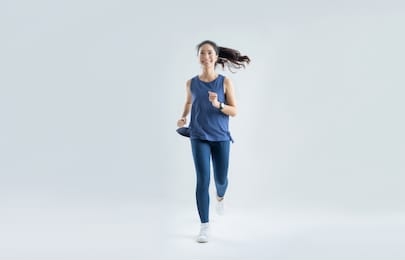 asian woman run marathon studio white background. 