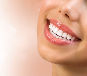healthy smile. teeth whitening. dental care concept. woman smile closeup. beautiful lips and teeth