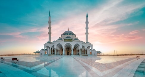 sharjah mosque largest masjid in dubai beautiful traditional islamic architecture, arabic letter means: indeed, prayer has been decreed upon the believers a decree of specified times