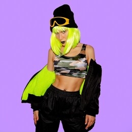 fashion hipster girl. clubbing swag style. party vibes. acid and military