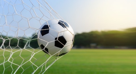 soccer ball in goal, sport and success business concept.